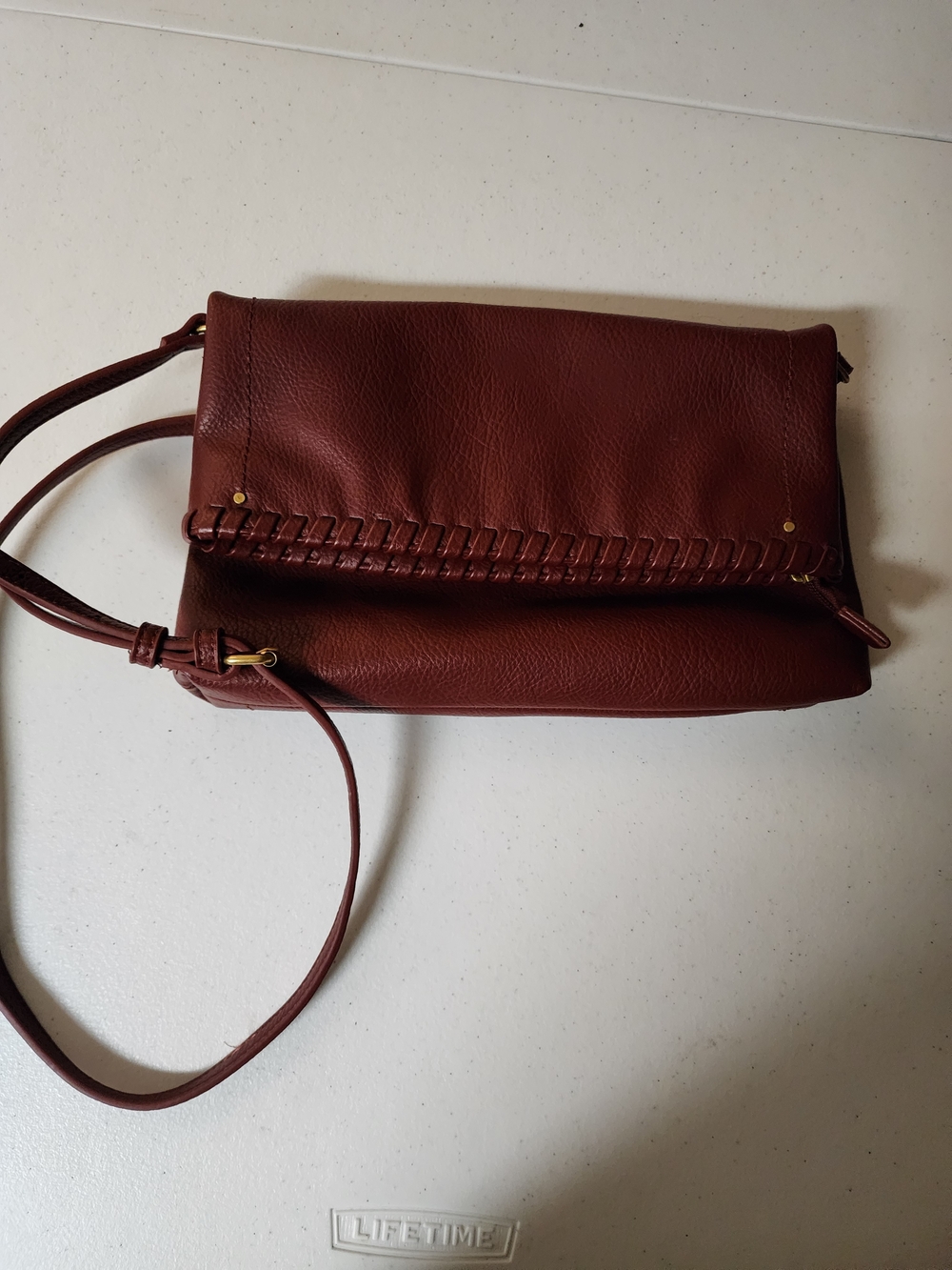 Style &co Women’s Crossbody Whip Stitch Fold-Over Bag in Oxblood. Faux Leather